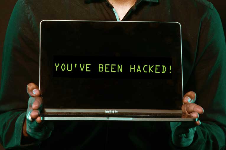 Laptop with You've Been Hacked Message